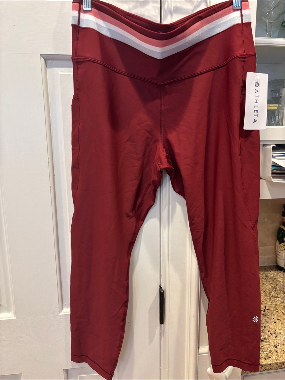 Athleta Interval Stash 7/8 Tight w/Striped waistband.